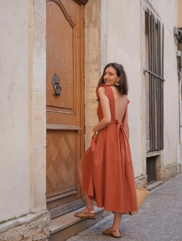 Terracotta outfit complementing warm skin tone with a natural earthy glow