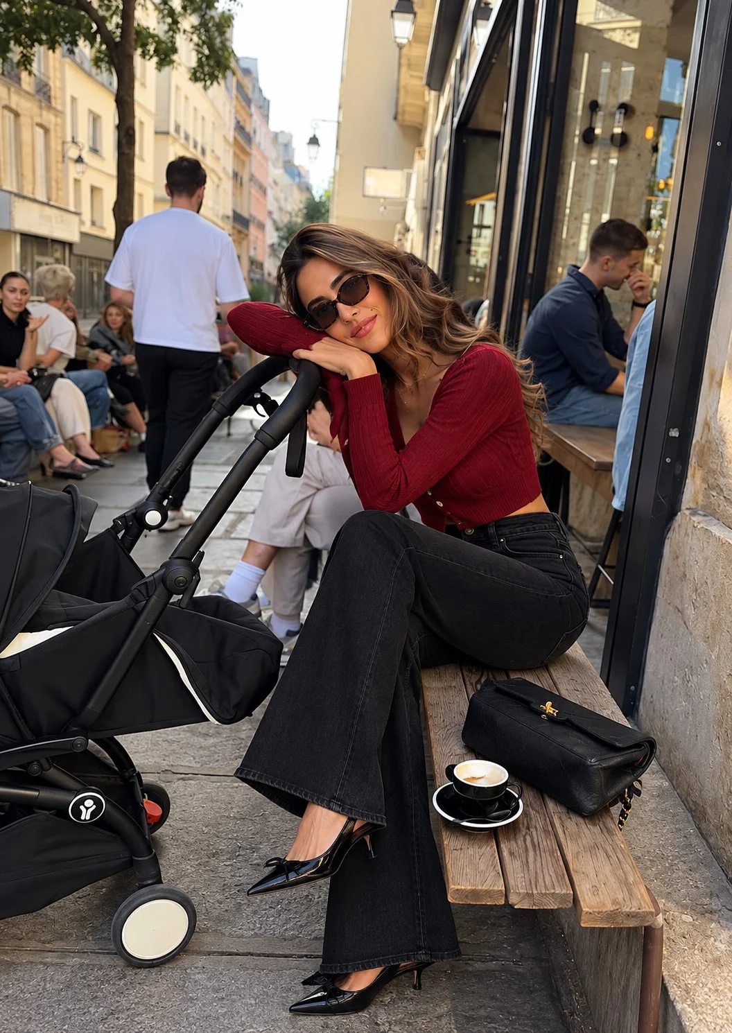 Dark red cropped cardigan with high-waisted black flared jeans and black kitten heels