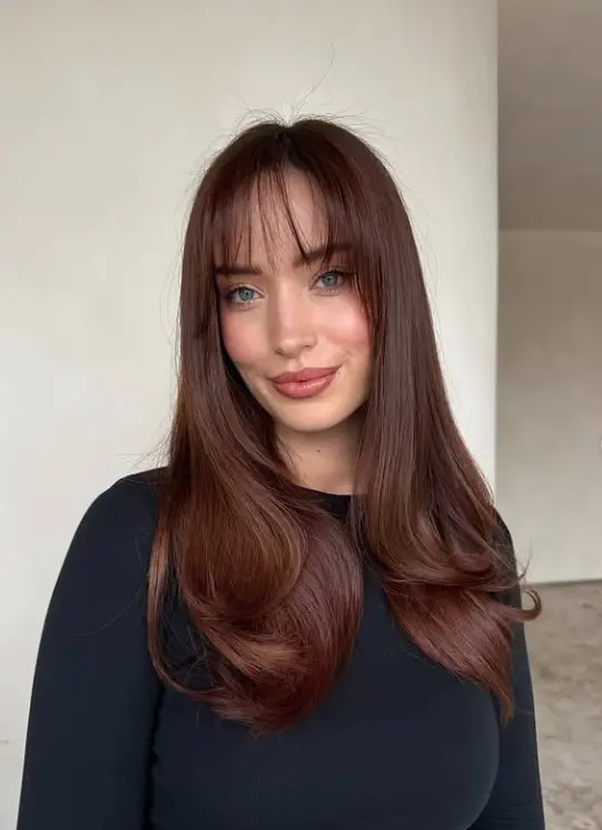 Light chestnut brown hair with natural brown depth and subtle golden warmth