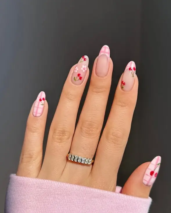 Pink and white gingham acrylic nails featuring a neat checkered pattern.