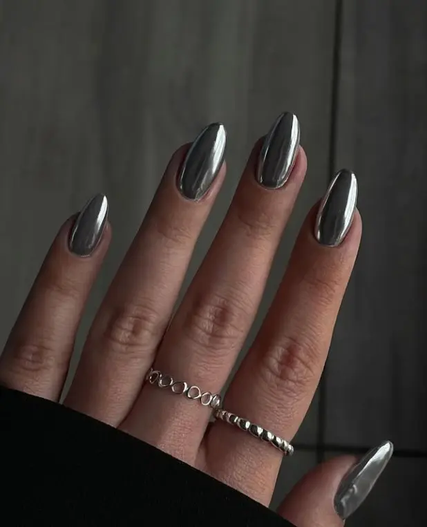 Silver mirror chrome acrylic nails with a highly reflective metallic finish.